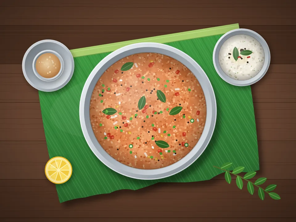 Orange-red tomato upma with curry leaves in a bowl on a banana leaf
